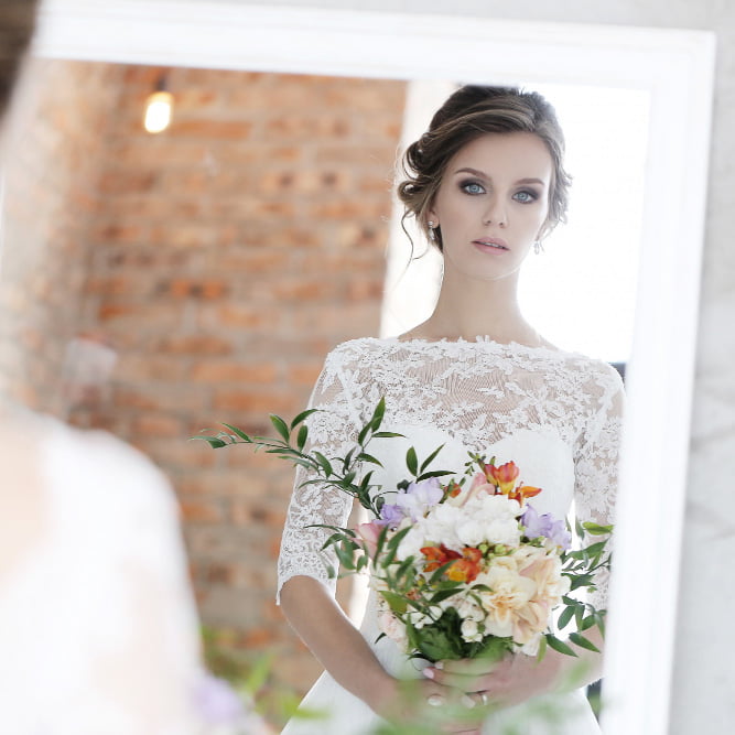 Bride with wedding flowers